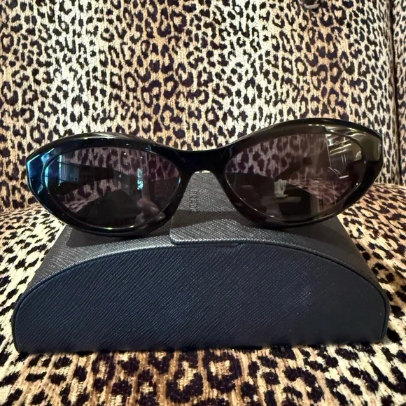 Prada Sleek Black Oval Sunglasses - Picture 3 of 4